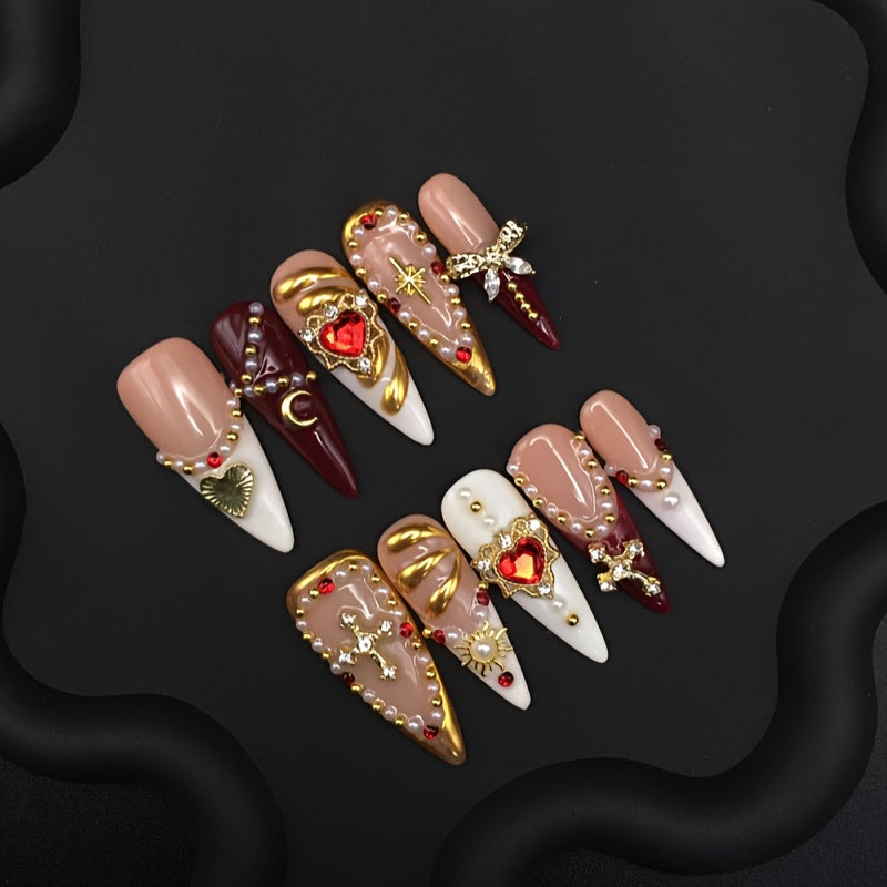 Uñas postizas con lazos y coronas doradas