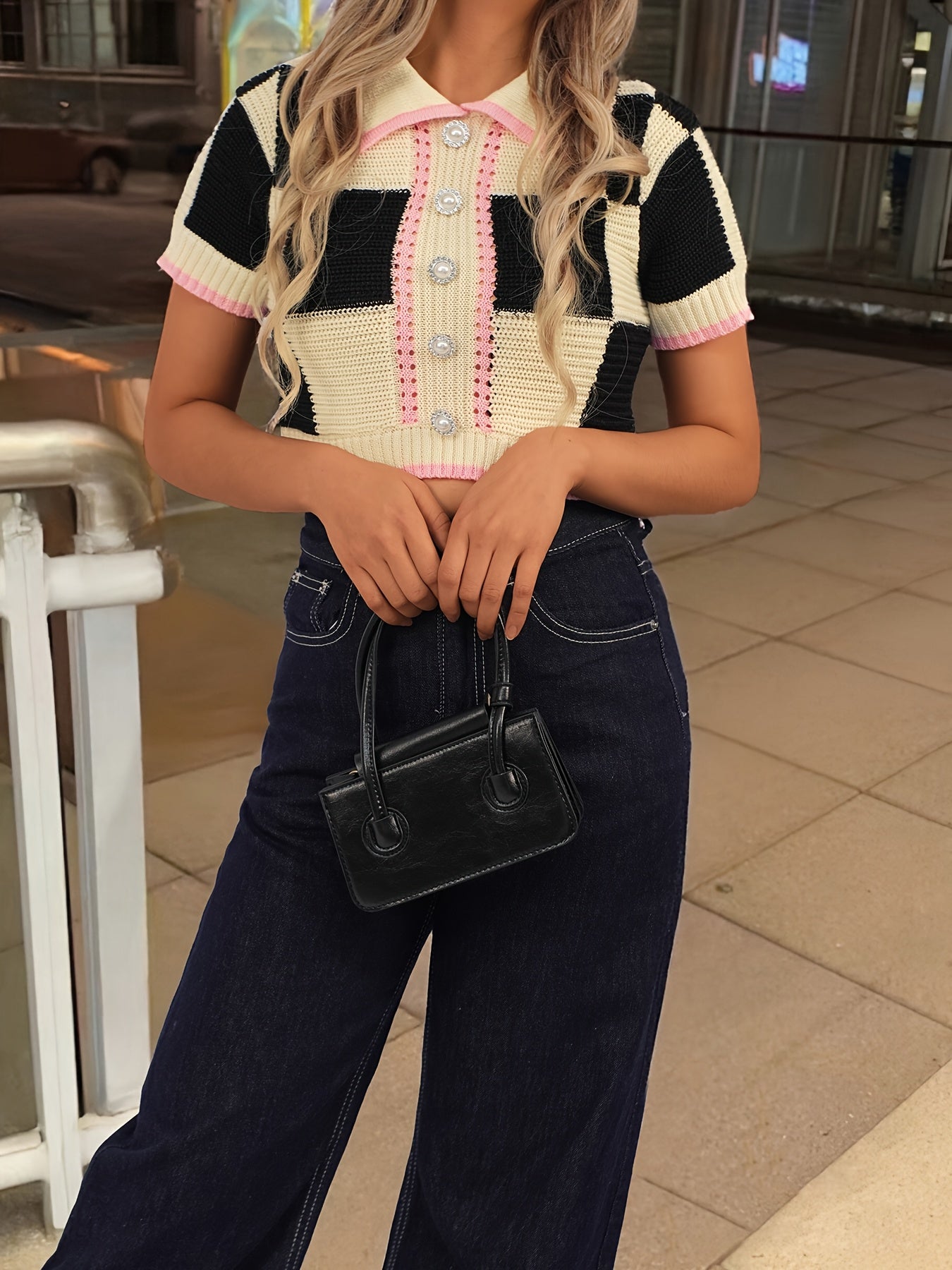 Top negro con botones de perlas + malla