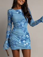 Vestido Dorado Floral con Mangas de Malla – Elegancia Nocturna