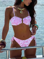 Bikini sexy con estampado floral rosa y tirantes desmontables.