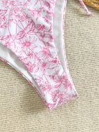 Bikini sexy con estampado floral rosa y tirantes desmontables.
