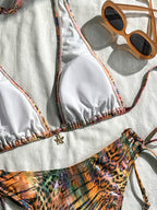 Bikini halter animal print láser.