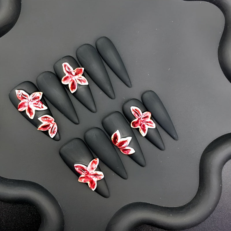 Uñas postizas negras mate con flores 3D