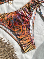 Bikini halter animal print láser.
