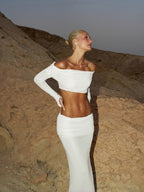 Set de dos piezas compuesto por vestido largo plisado