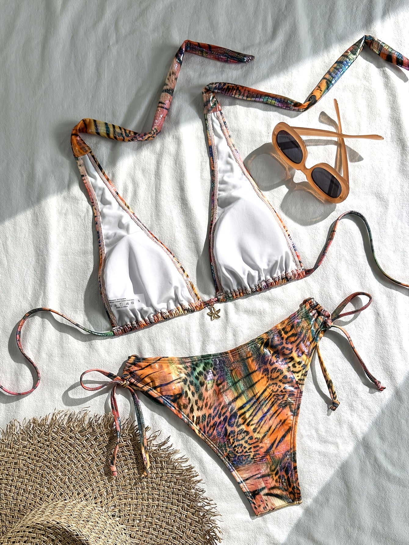 Bikini halter animal print láser.